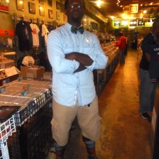 The minute I arrived in Criminal Records in Little 5 Points, Mr. Real Talk Raps caught ALL of my attention. His fit just flowed so well. Let's get to it! Button Down Shirt: Forever 21 for Men. Shorts: Cargo's from Footlocker. Bowtie: American Armadillo. Socks: Men's Warehouse. Shoes: Call It Spring. Button on the lef side of his chest, his own! Thank you so much Real Talk! Looking forward to upcoming projects and keeping up with your style!